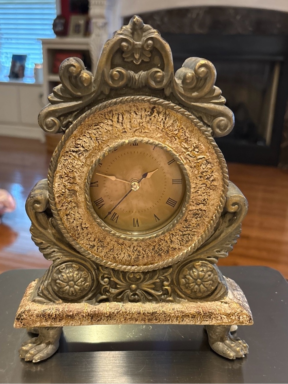 Vintage baroque style mantel clock, aged gold or brass finished Resin frame.